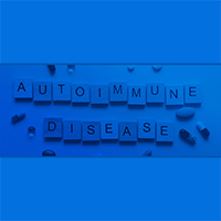 Autoimmune Diseases spelled out with scrabble tiles with pills around it