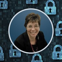 Coni Tartaglia Headshot with security stock photo background with padlocks and binary code